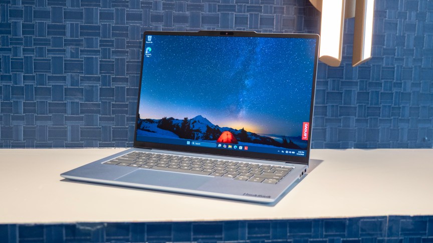 The ThinkBook 14x Gen 2 sits on a desk, facing forward.